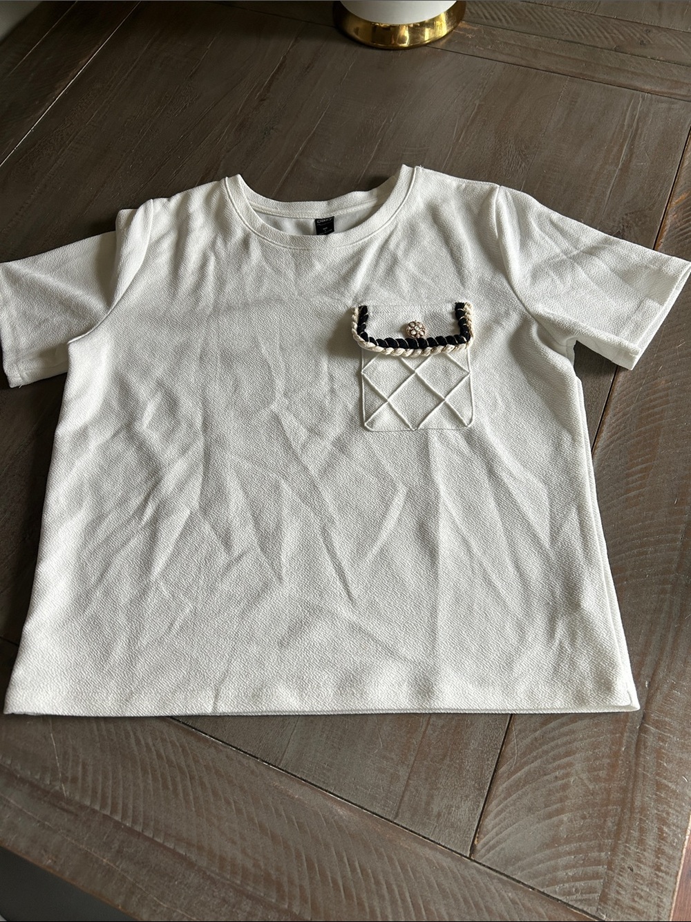Girls White Short-Sleeve Knit Top with Quilted Pocket Detail